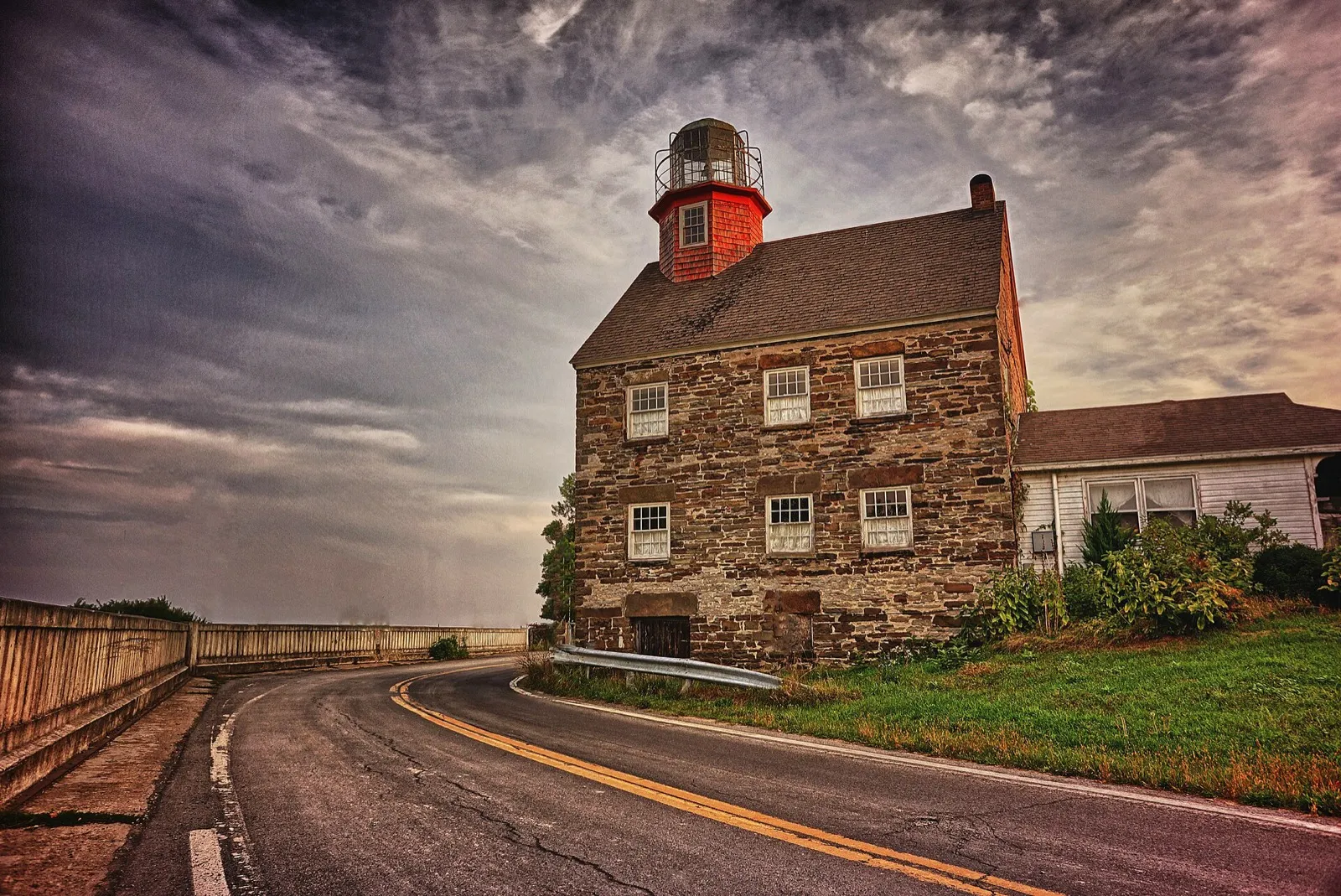 Stone Selkirk Lighthouse at the mouth of the Salmon River (nearby Selkirk Lighthouse, Port Ontario)