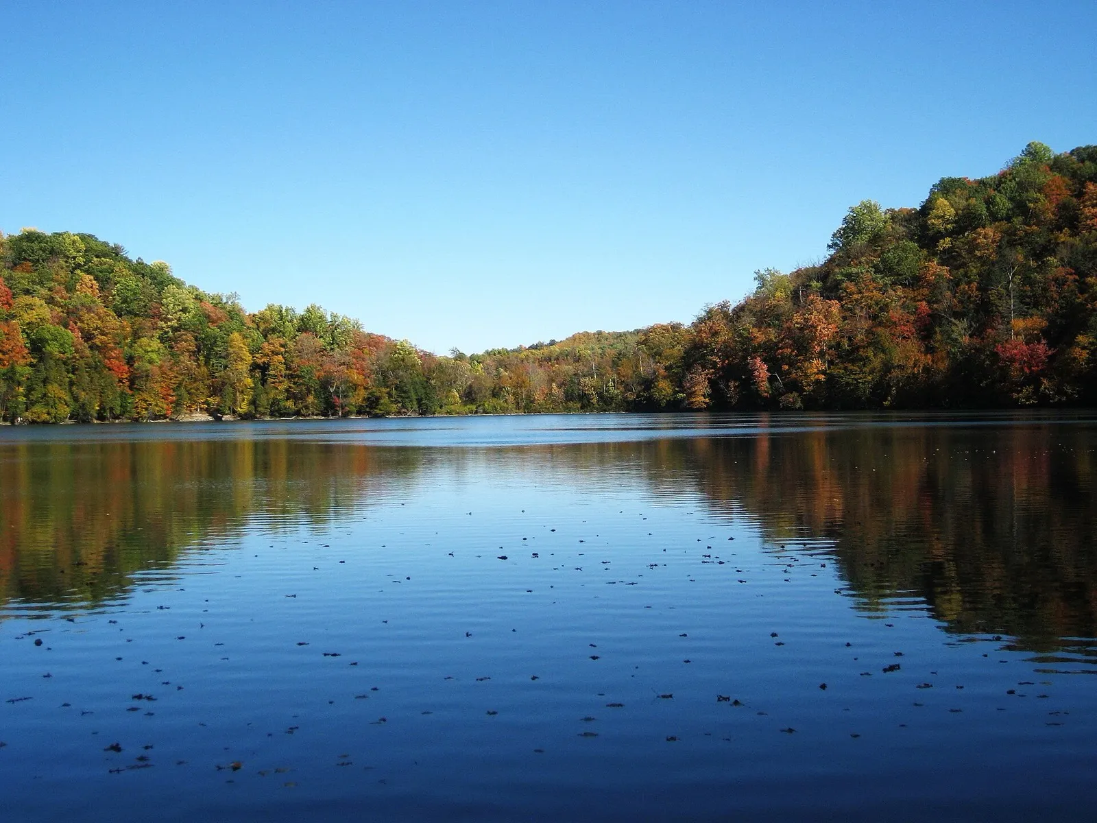 Fall foliage reflected in Round Lake at Green Lakes State Park