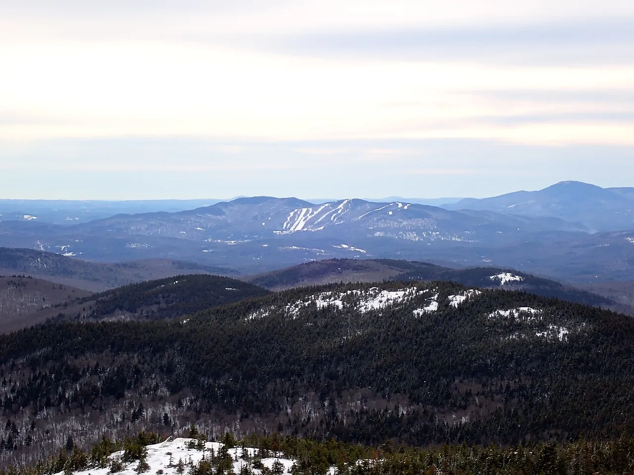 Southward view of Orange Mountain and Ragged Mountain from Cardigan Mountain in New Hampshire.