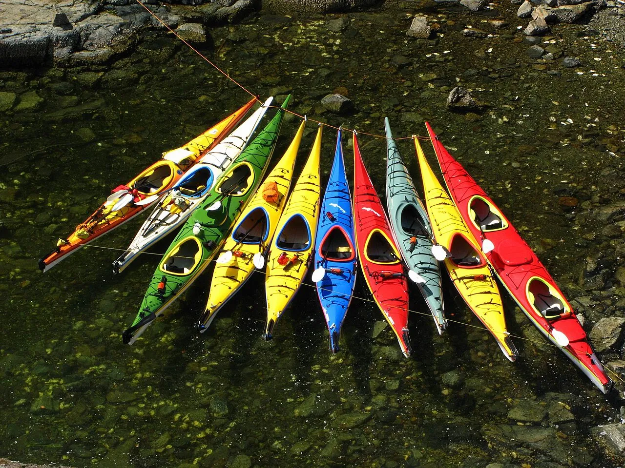 Kayaks in clear water