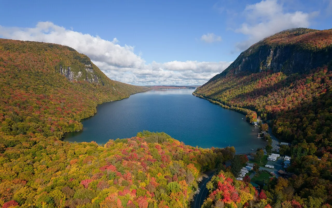 Drone view of Lake Willoughby , Vermont , with Mount Hor on the left and Mount Pisgah on the right.