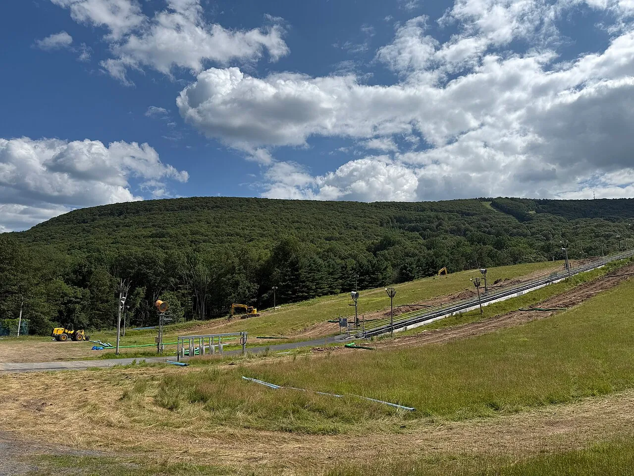 Camelback Mountain’s ski trails seen from Resort Drive in summer