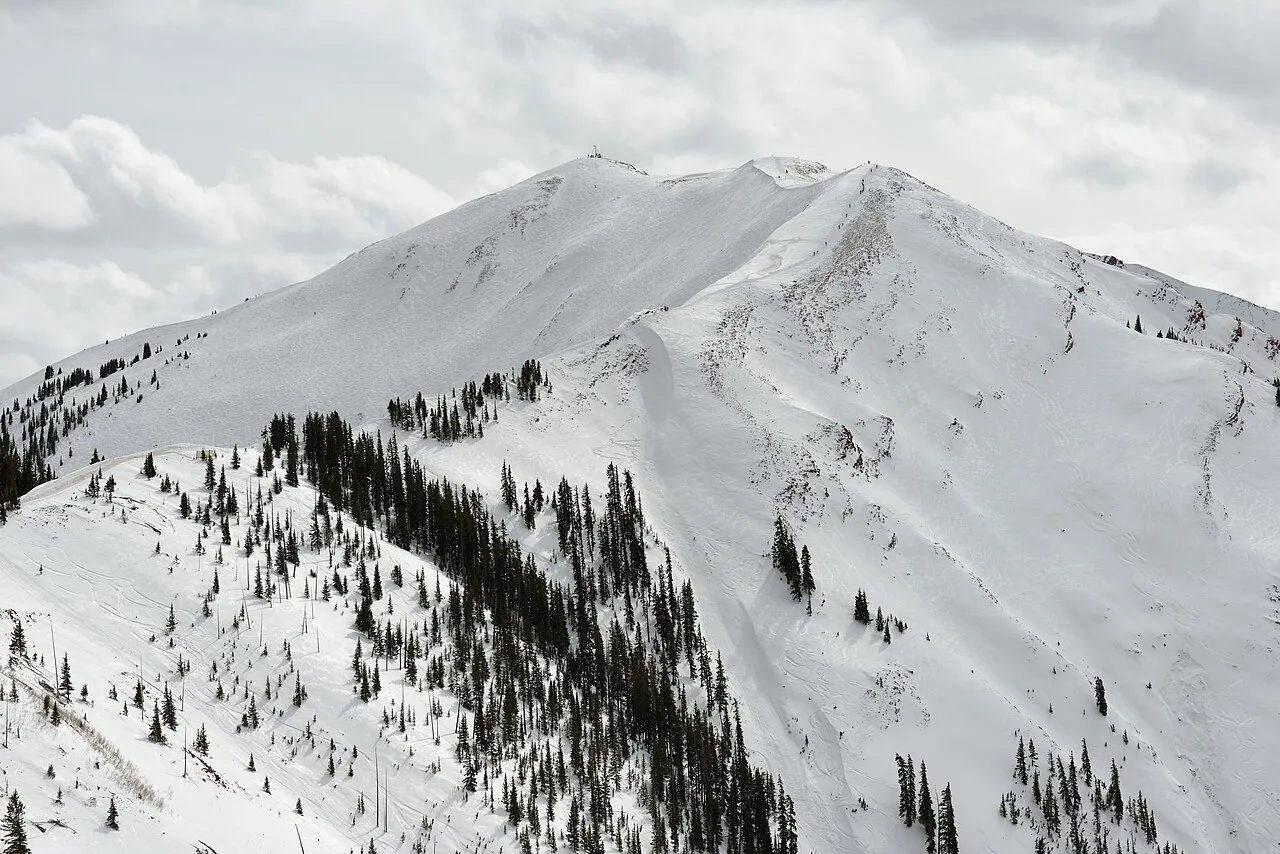 Highland peak with Highland bowl in the Maroon Bells–Snowmass Wilderness as seen from the Loge Peak in the Aspen Highlands , Colorado.