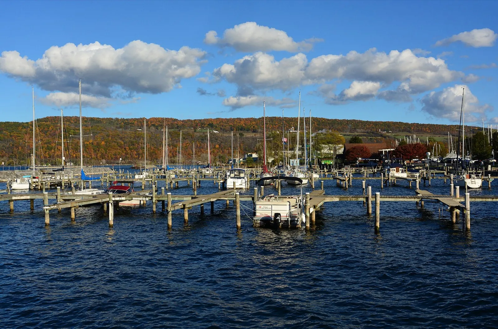 Sailboats at the marina with fall hills behind (nearby Watkins Glen, Seneca Lake)