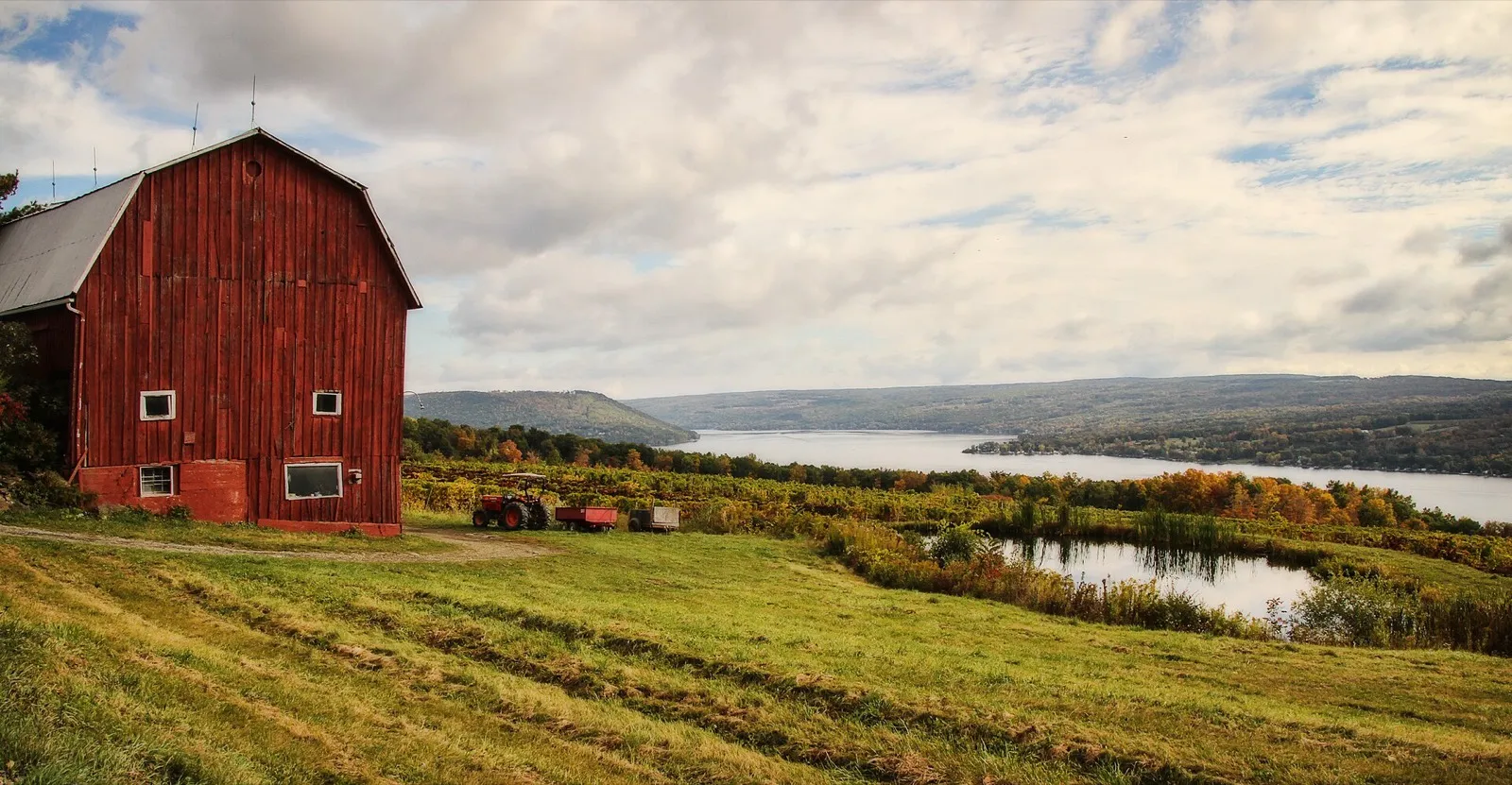 Red barn above Keuka Lake in the fall