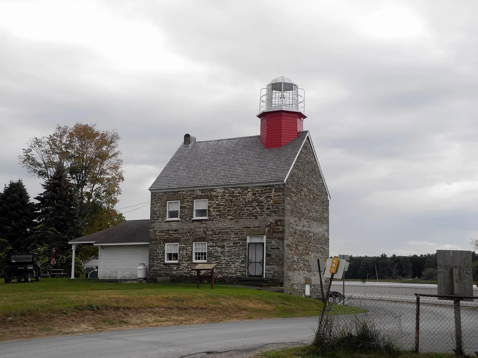 Selkirk Lighthouse beside the harbor road (nearby Selkirk Lighthouse, Port Ontario)
